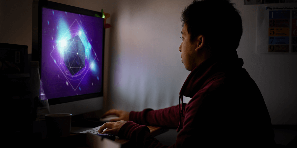 A young boy uses a computer